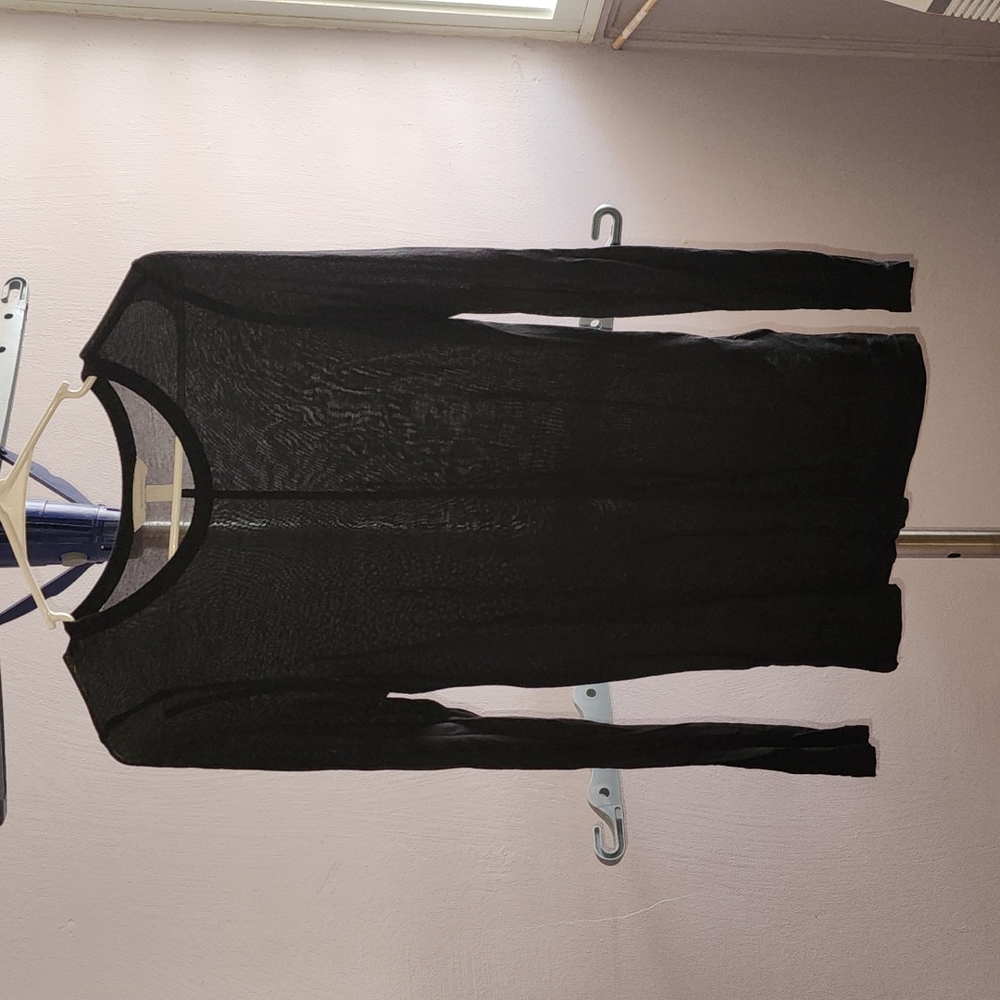 Long sleeve shirt . Extra small size. Color Black. Brand Banana Republic Sunday
